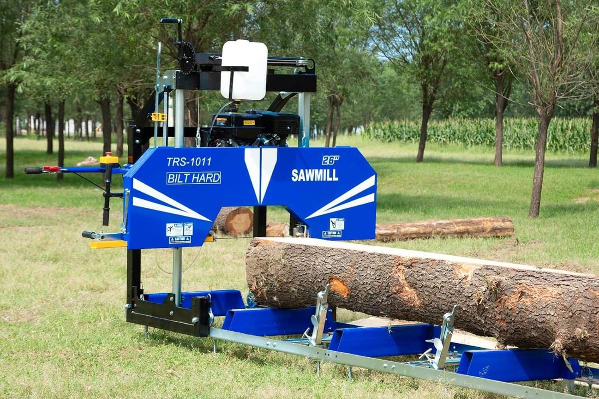 BILT HARD 26 inch portable sawmill with a log on the track