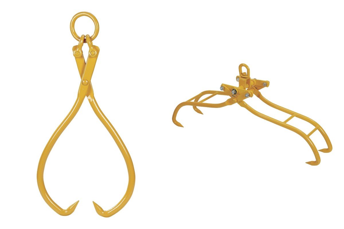 Roughneck lifting log tongs beside a pair of skidding tongs