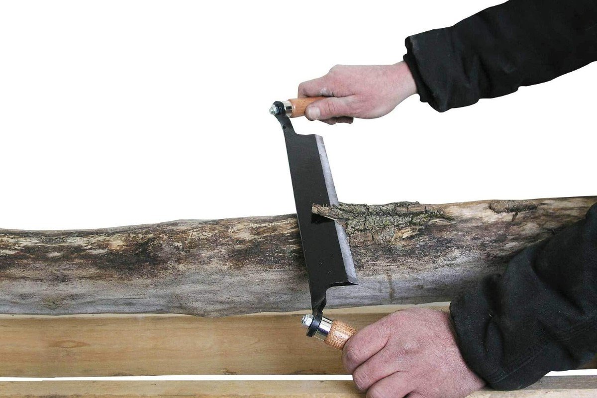 Timber Tuff TMB-10S straight drawknife peeling bark from a log