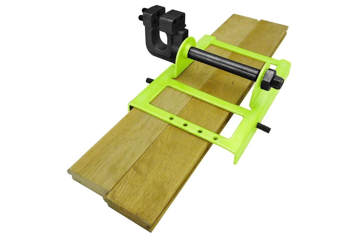 Timber Tuff TMW-56 lumber cutting guide clamped to the edge of a board